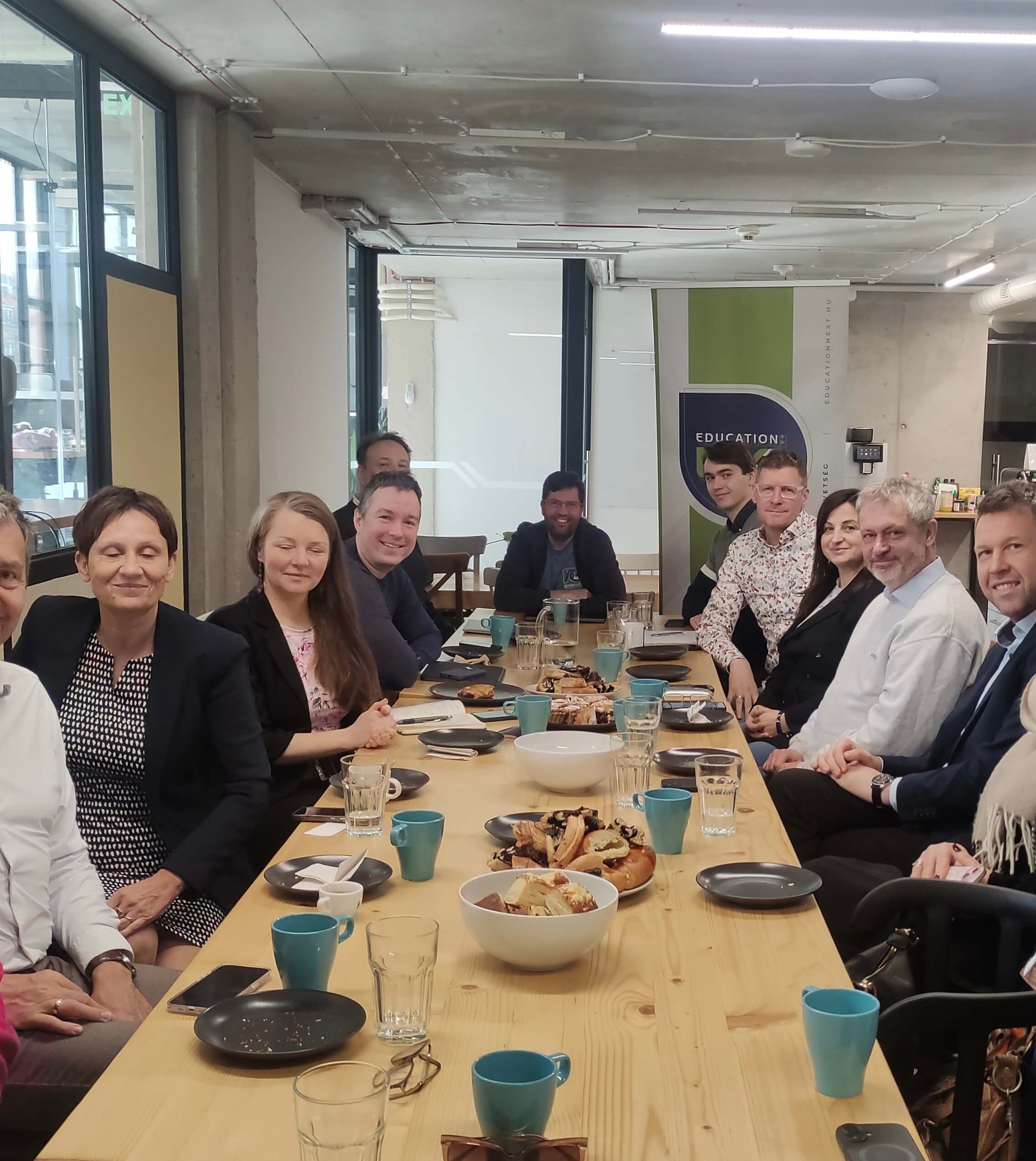 Education Next member breakfast around a long table